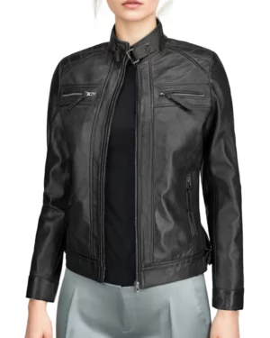 Stylish women’s biker jacket in black leather – model poses casually, showing functional unzipped angle.