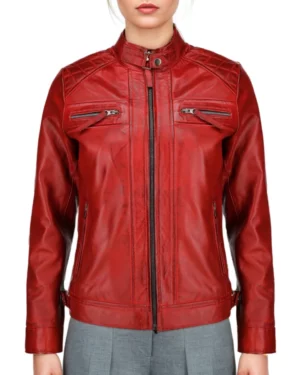 Women’s red leather biker jacket – front view showcasing slim fit, zip-up closure, and quilted shoulder details for a sleek moto look.