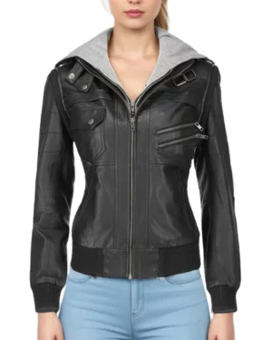 Front view of women’s black hooded leather biker jacket with zip closure and silver hardware, showcasing sleek fitted silhouette and ribbed hem