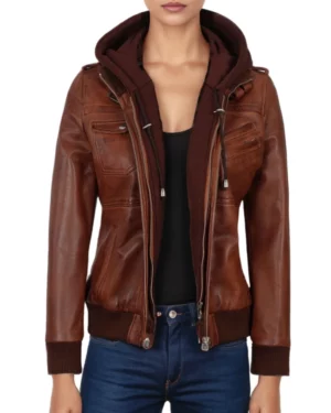 Women’s brown leather bomber jacket worn unzipped, revealing layered hoodie and inner lining, perfect for a relaxed urban look.