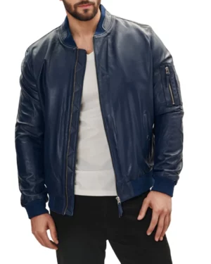 Men's blue leather bomber jacket unzipped, worn over a casual white tee, emphasizing versatility, layering potential, and laid-back urban style