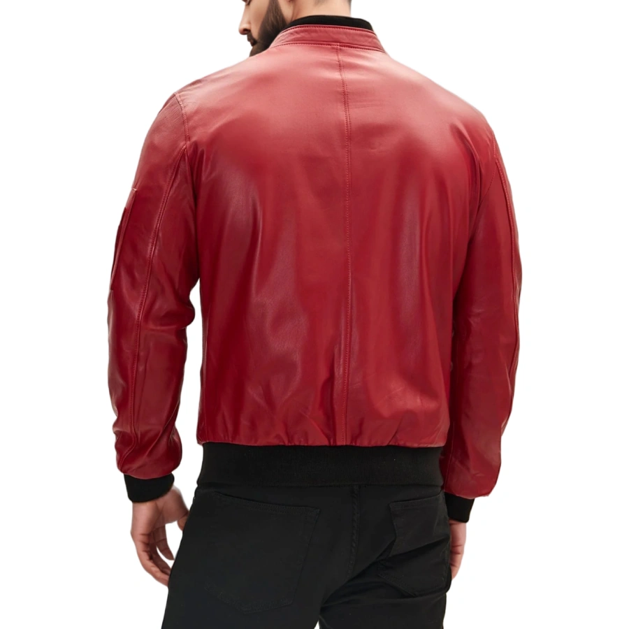 Back view of men's red leather bomber jacket, emphasizing the quality leather craftsmanship, ribbed waistband, and elegant stitching detail ideal for a contemporary look