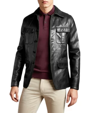 Men’s black leather utility jacket with button-up closure and flap pockets, paired with beige pants and maroon polo shirt – ideal for fall and winter fashion
